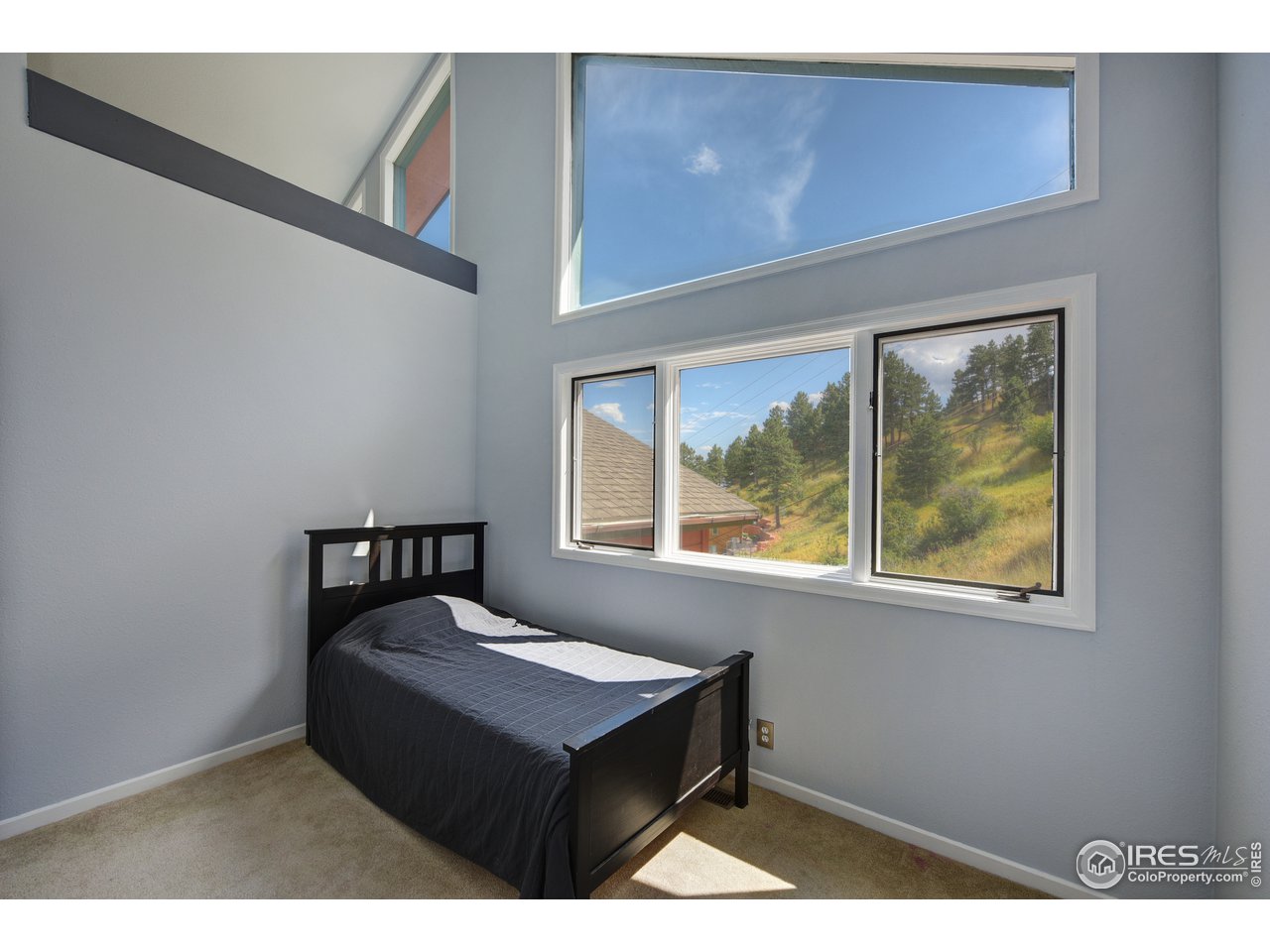 635 North Cedar Brook Road Boulder, CO 80304 - Photo 19 of 39 a balcony with a window