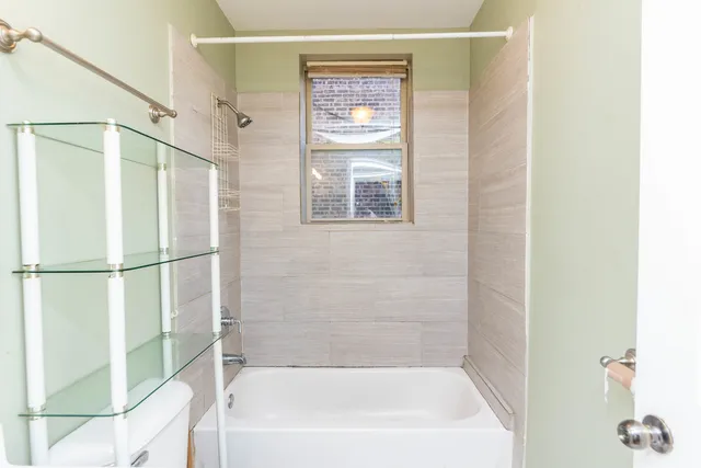 a bathroom with a bathtub