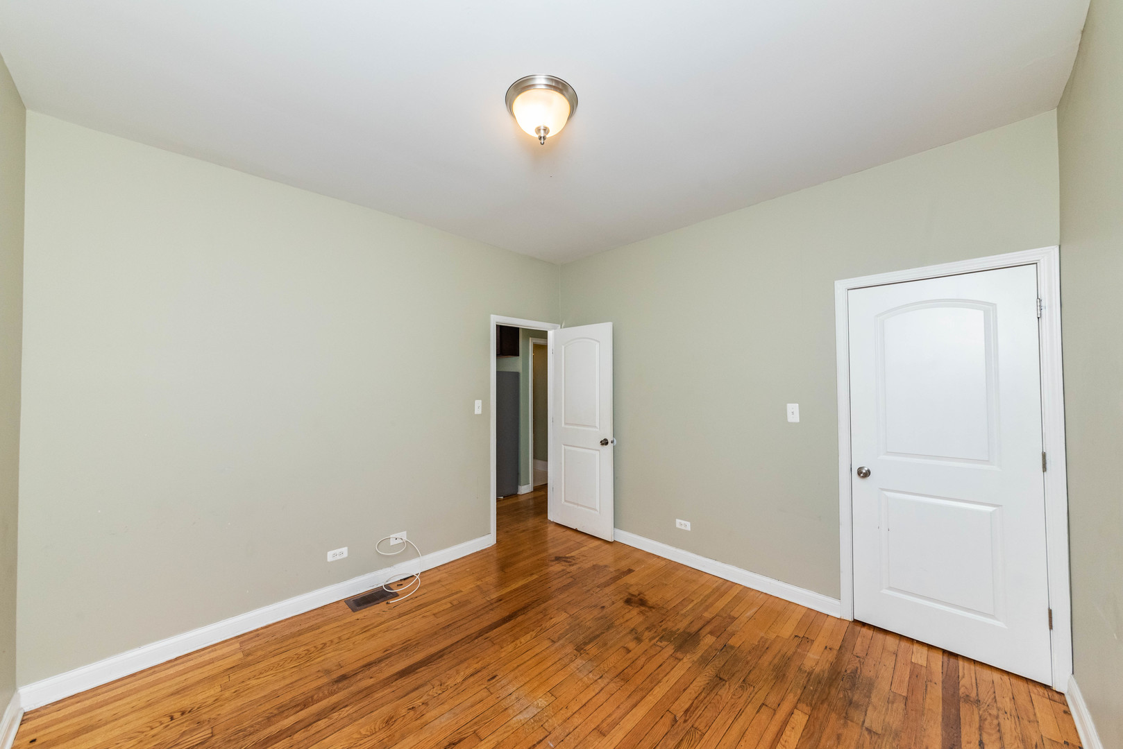 2812 East 76th Street, Unit 3 Chicago, IL 60649 - Photo 10 of 21 a view of an empty room