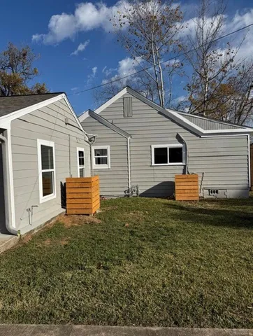 a house view with a backyard space