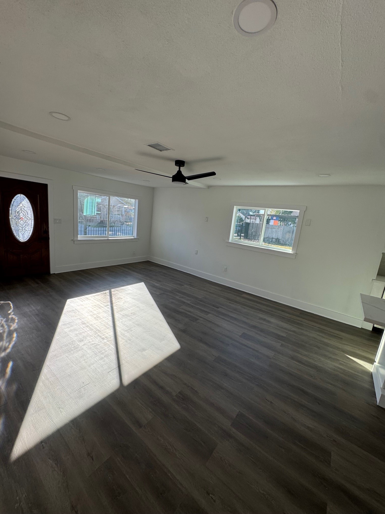 7909 Goode Street, Unit A Houston, TX 77012 - Photo 7 of 25 a view of an empty room and window