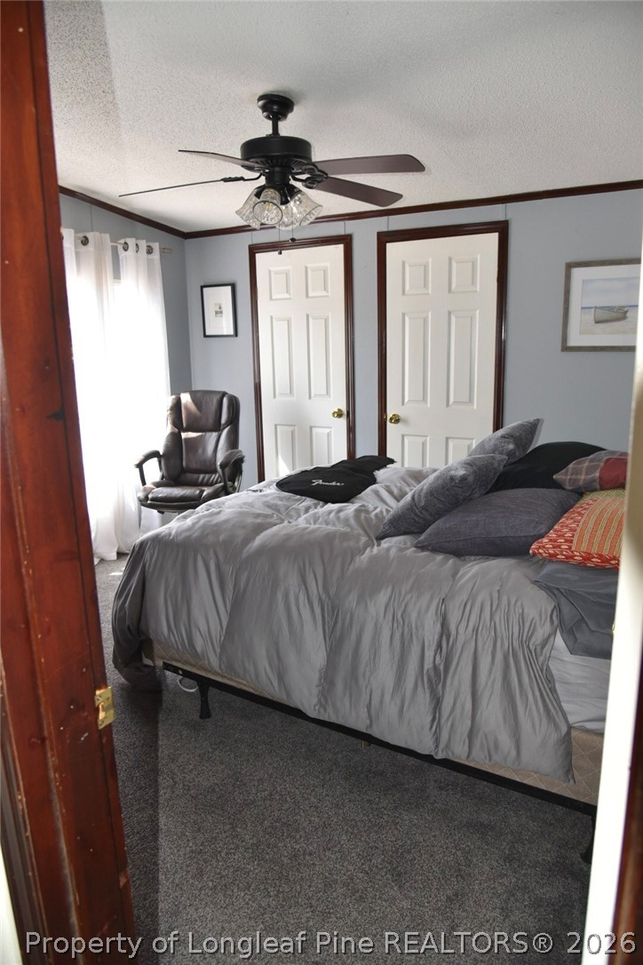 780 Old River Road Carthage, NC 28327 - Photo 17 of 28 a bedroom with a bed and window