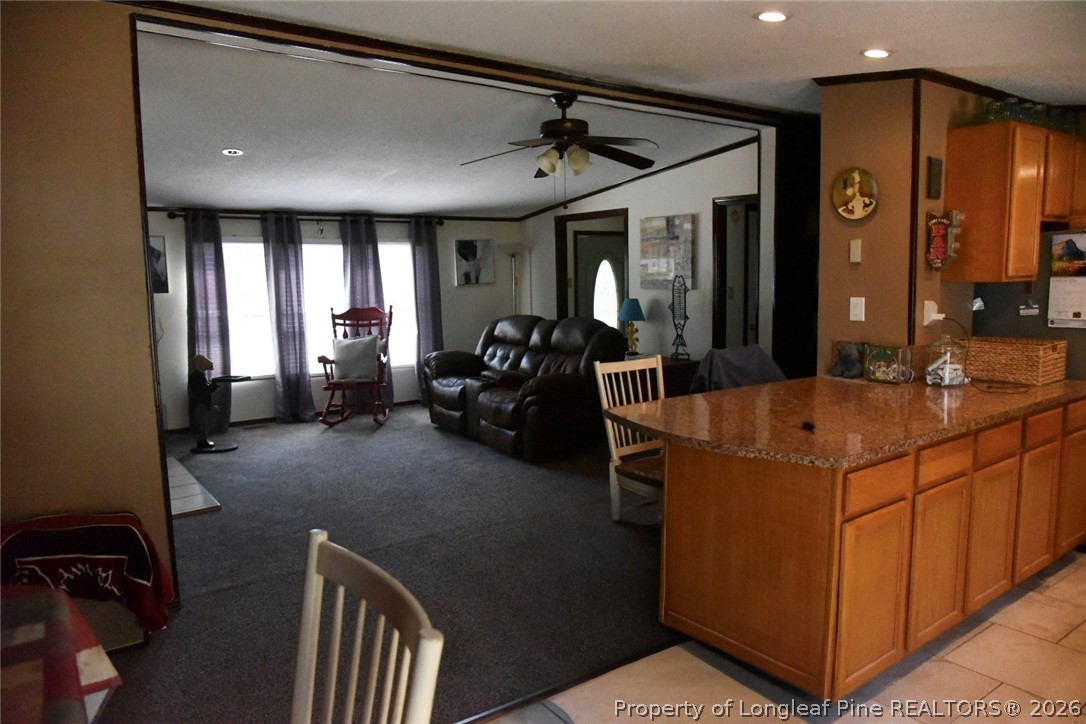 780 Old River Road Carthage, NC 28327 - Photo 6 of 28 a view of living room with furniture and a large window