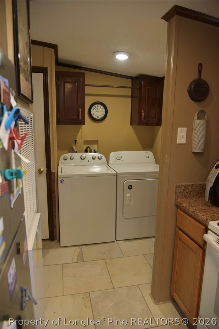 780 Old River Road Carthage, NC 28327 - Photo 8 of 28 a utility room with dryer and washer