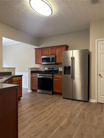 a view of room with window and ceiling fan