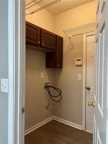 a bathroom with a bathtub and next to a window