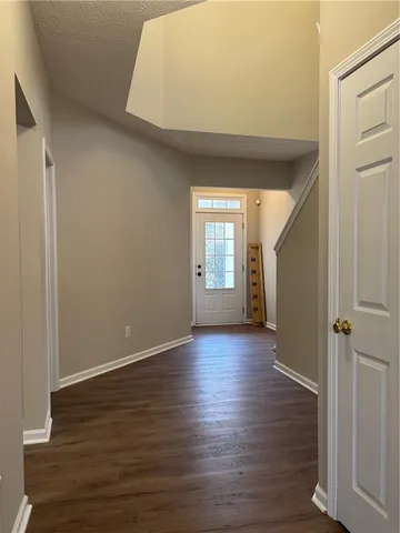 a view of outdoor space with wooden fence