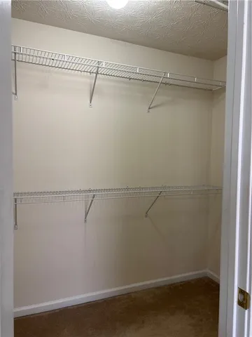 a view of a wrought iron fences in front of house