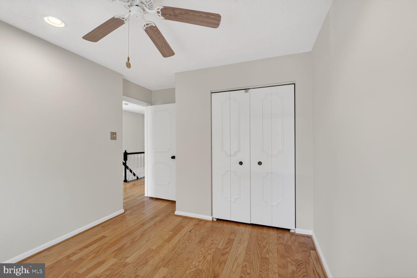 7265 Kousa Lane Springfield, VA 22152 - Photo 21 of 50 wooden floor in an empty room