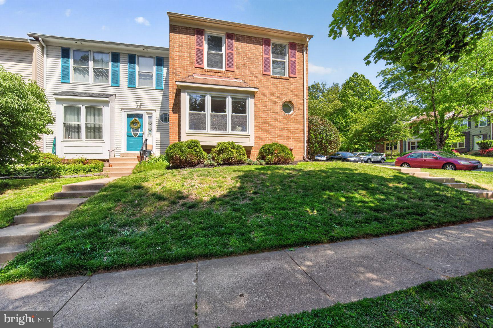 7265 Kousa Lane Springfield, VA 22152 - Photo 36 of 50 front view of a house with a yard