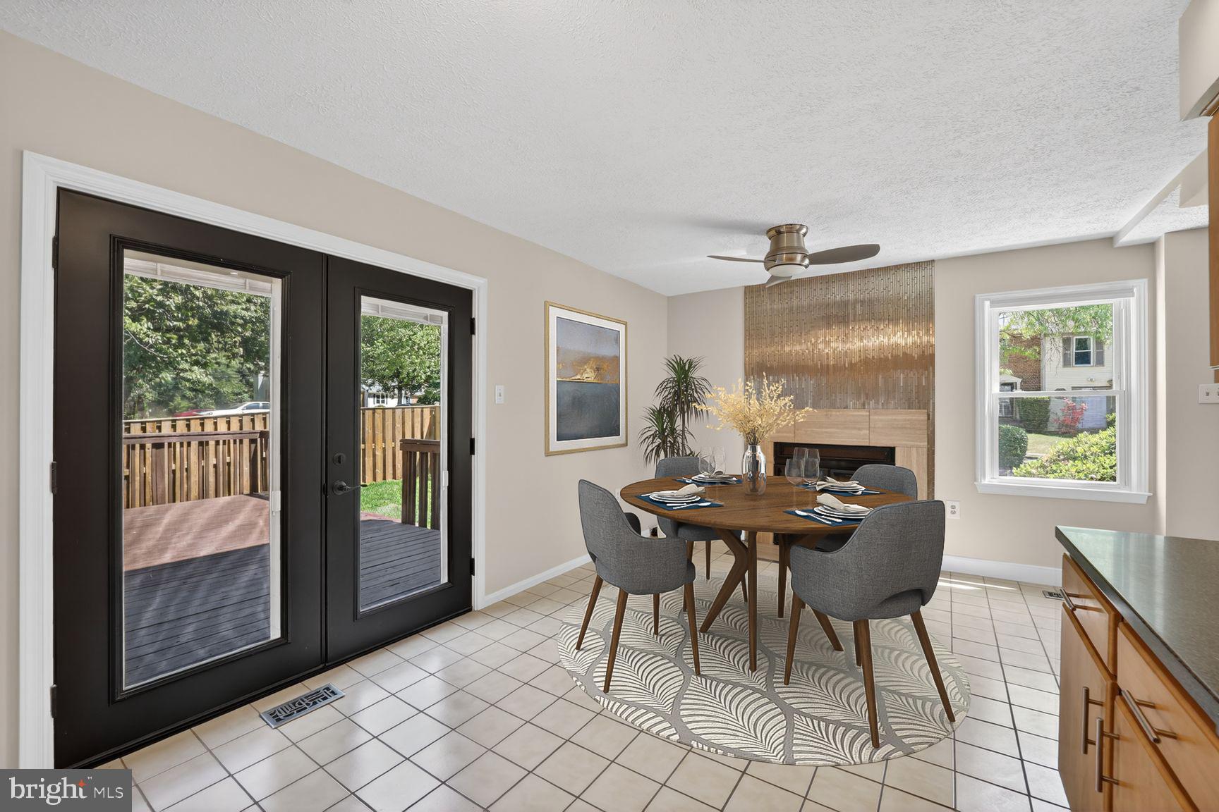 7265 Kousa Lane Springfield, VA 22152 - Photo 6 of 50 a workspace with furniture and a window