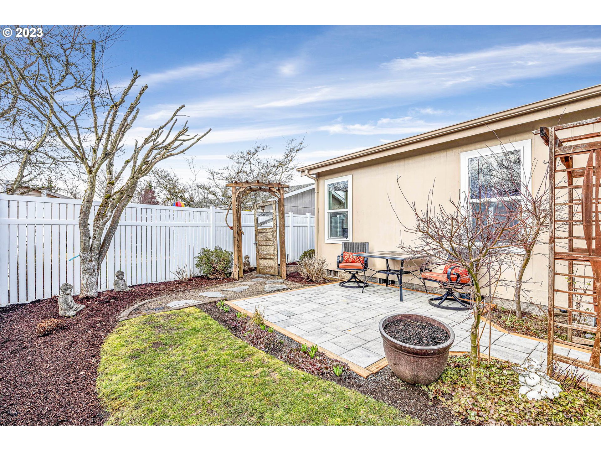 2458 Blue Boy Lane Eugene, OR 97404 - Photo 26 of 28 a view of a house with backyard porch and sitting area