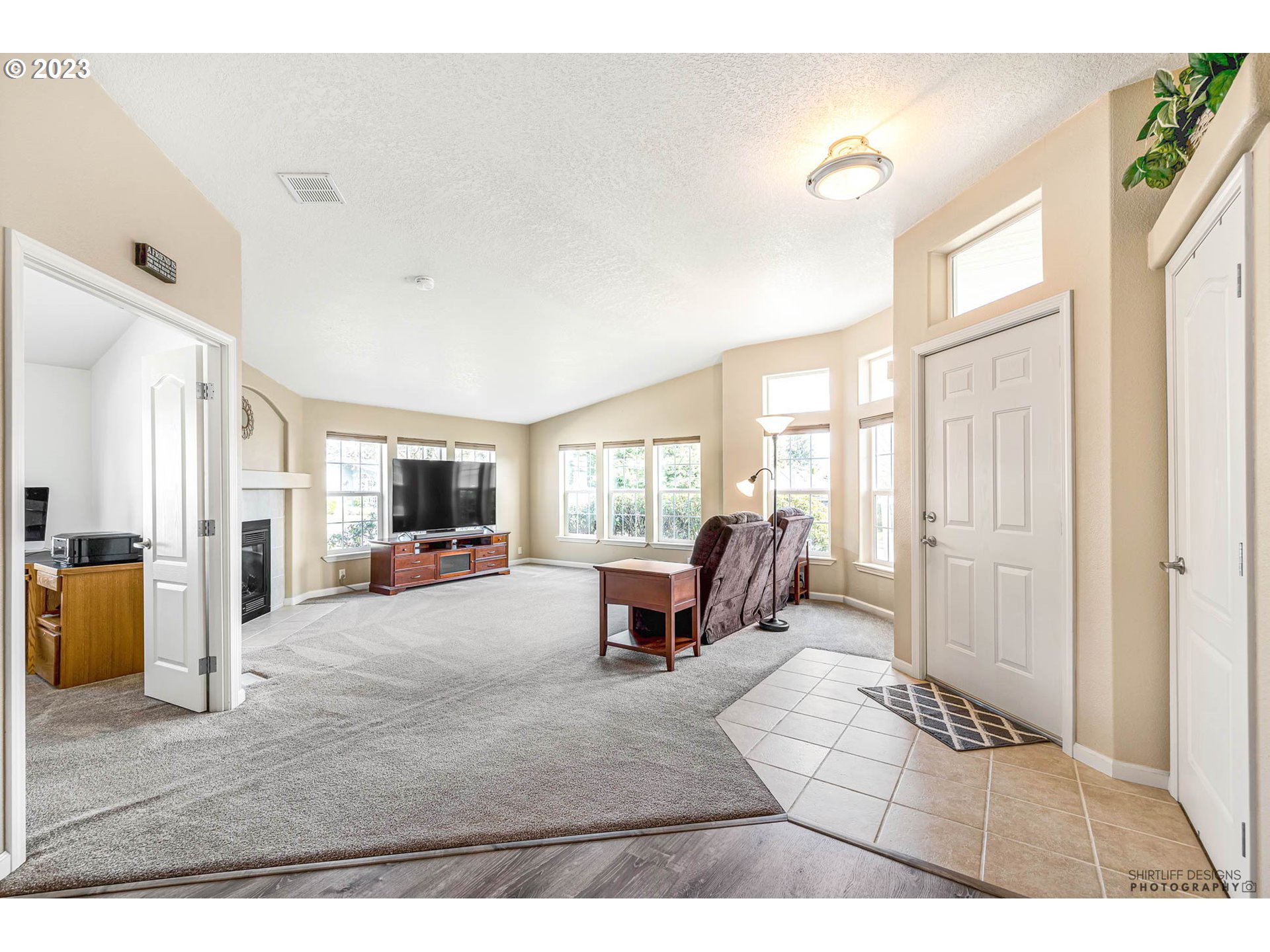 2458 Blue Boy Lane Eugene, OR 97404 - Photo 3 of 28 a living room with furniture window and wooden floor