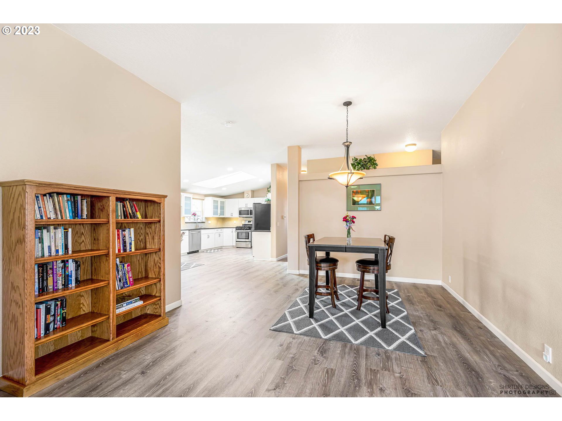 2458 Blue Boy Lane Eugene, OR 97404 - Photo 8 of 28 a living room with furniture and a wooden floor