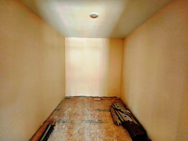 a balcony view with a seating space