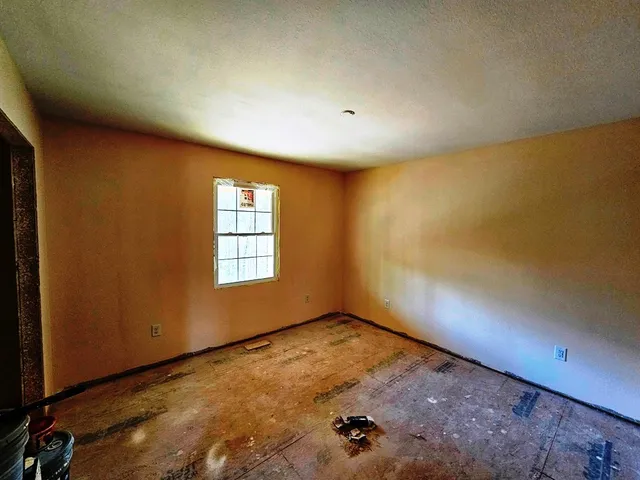 a backyard of a house with lots of green space