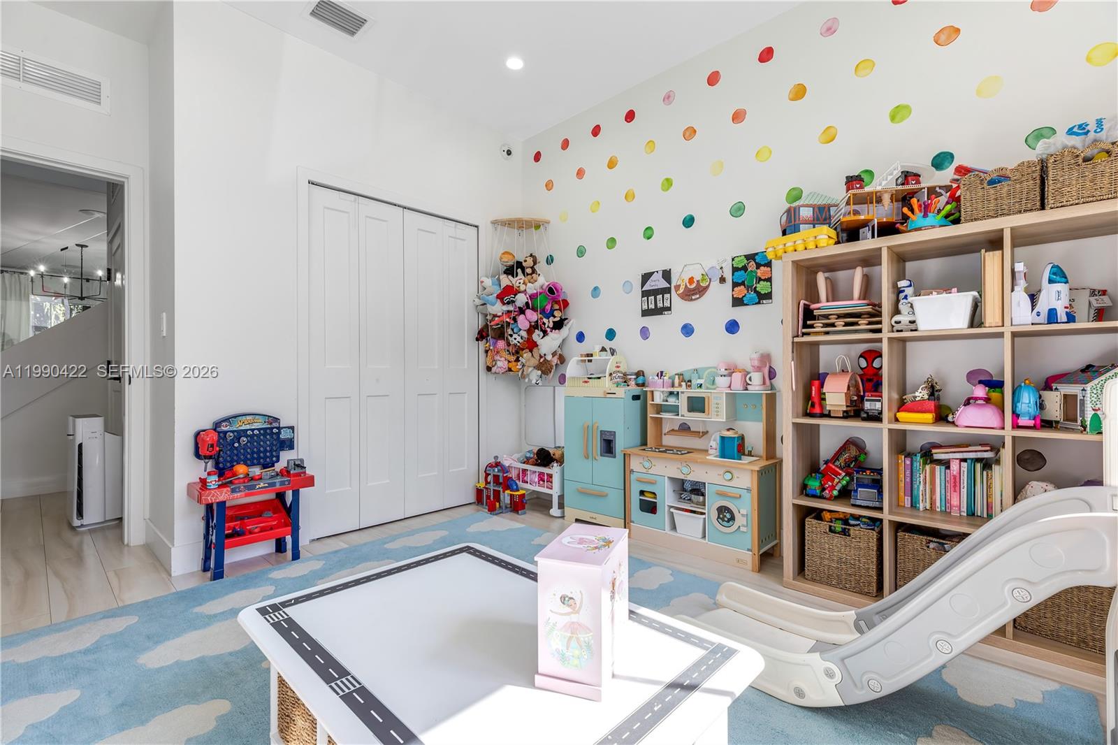 2775 Southwest 101st Court Miami, FL 33165 - Photo 16 of 46 a room with furniture and book shelf