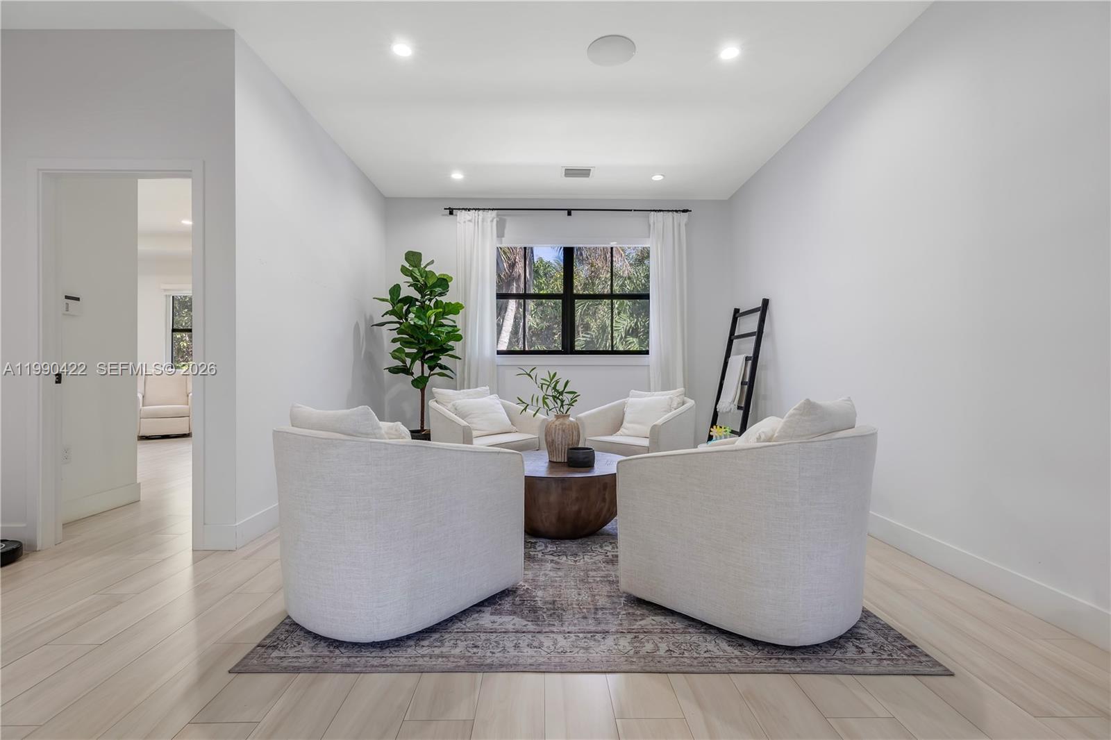 2775 Southwest 101st Court Miami, FL 33165 - Photo 19 of 46 a living room with furniture and a large window