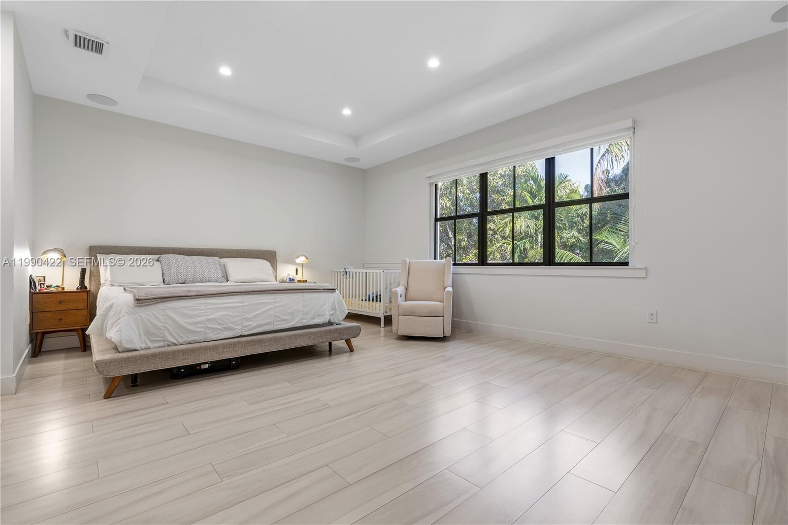 2775 Southwest 101st Court Miami, FL 33165 - Photo 27 of 46 a bedroom with a bed and a window