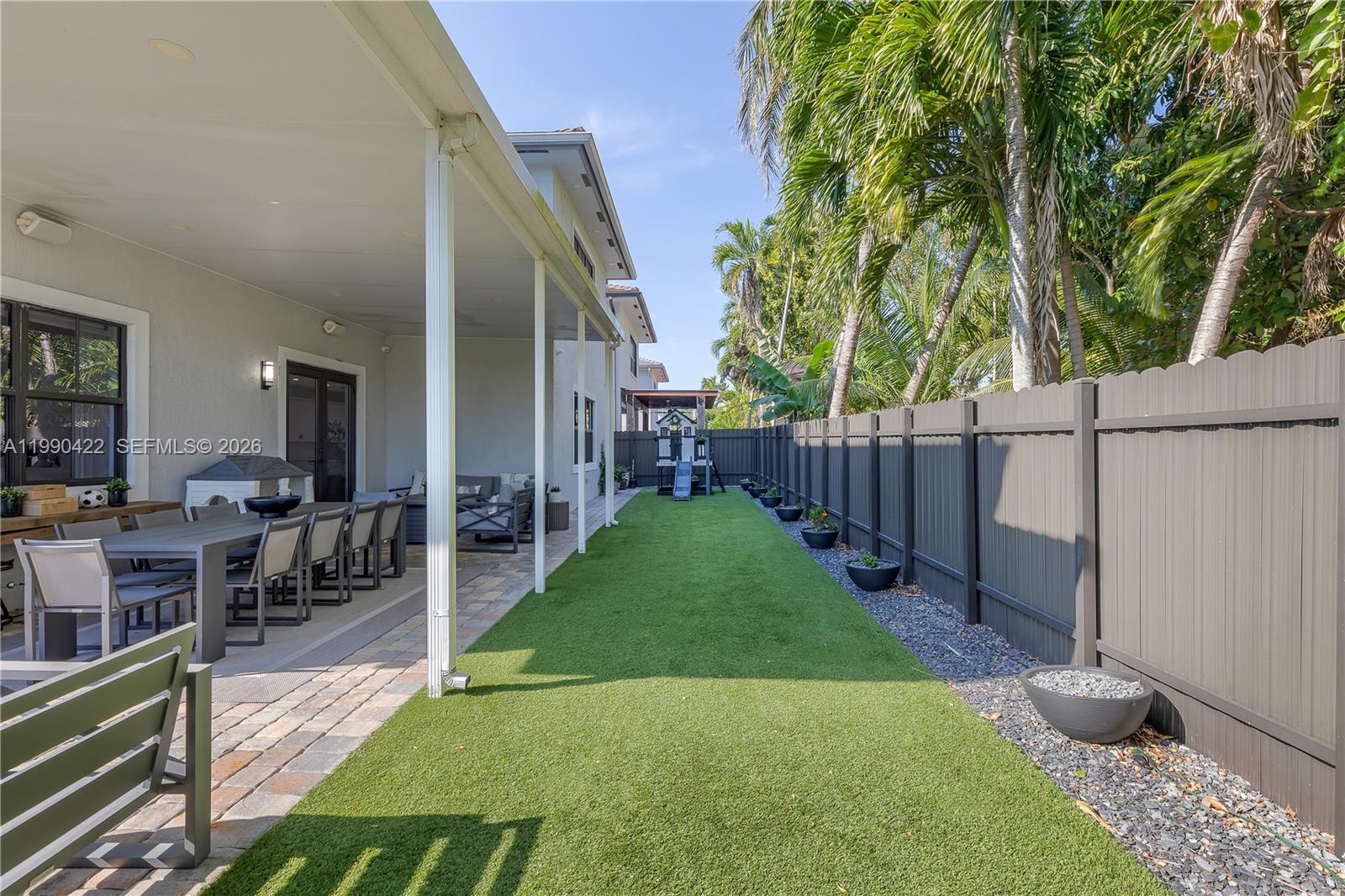 2775 Southwest 101st Court Miami, FL 33165 - Photo 40 of 46 a view of a backyard with sitting area