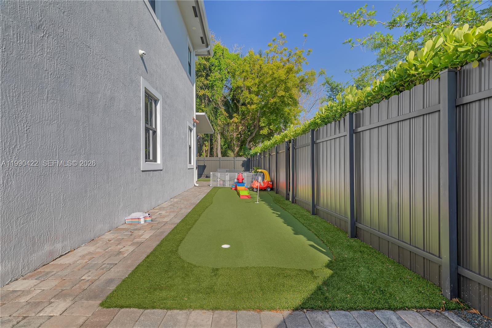 2775 Southwest 101st Court Miami, FL 33165 - Photo 41 of 46 a view of a backyard with a small cabin