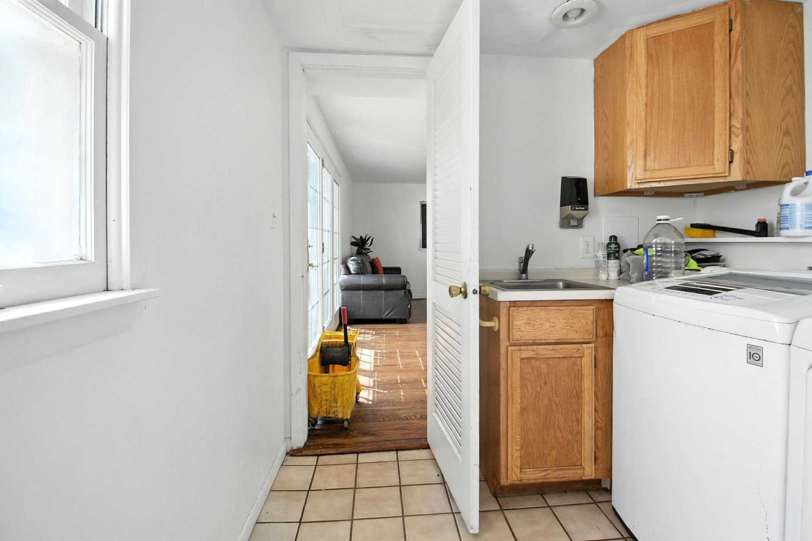 406 Madison Street Joliet, IL 60435 - Photo 22 of 40 a room with storage and utility