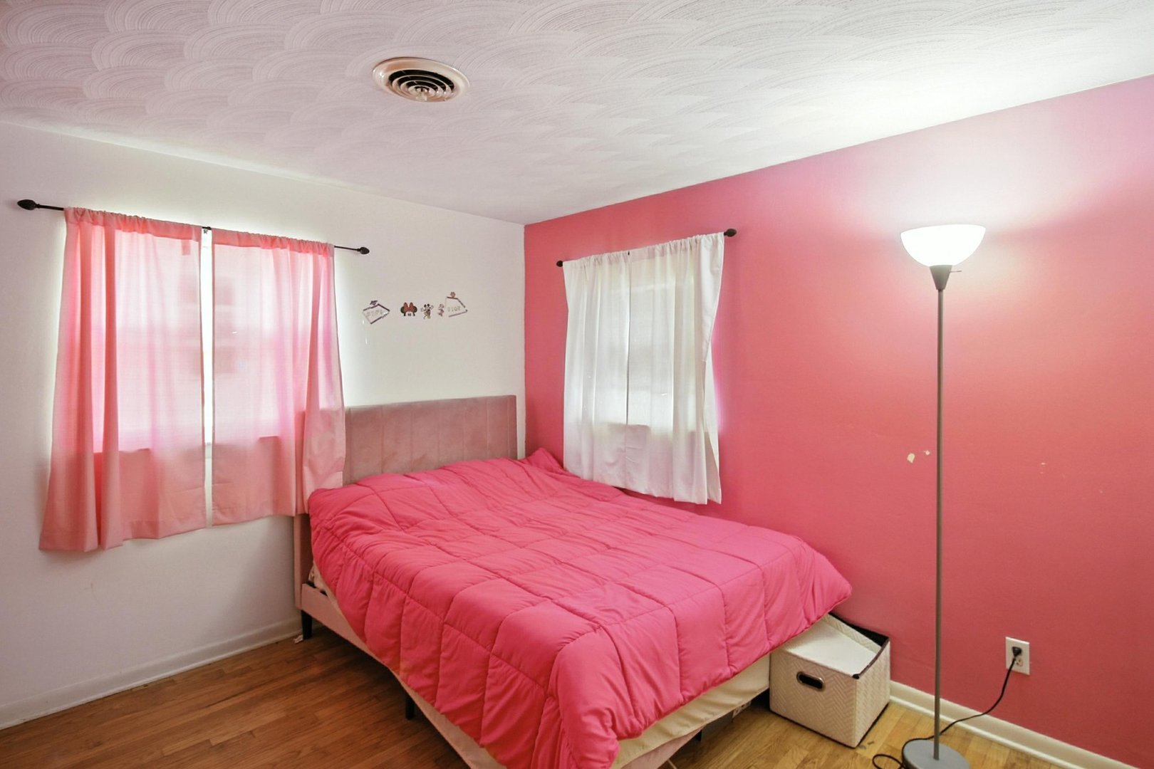 406 Madison Street Joliet, IL 60435 - Photo 25 of 40 a bedroom with a bed and a window