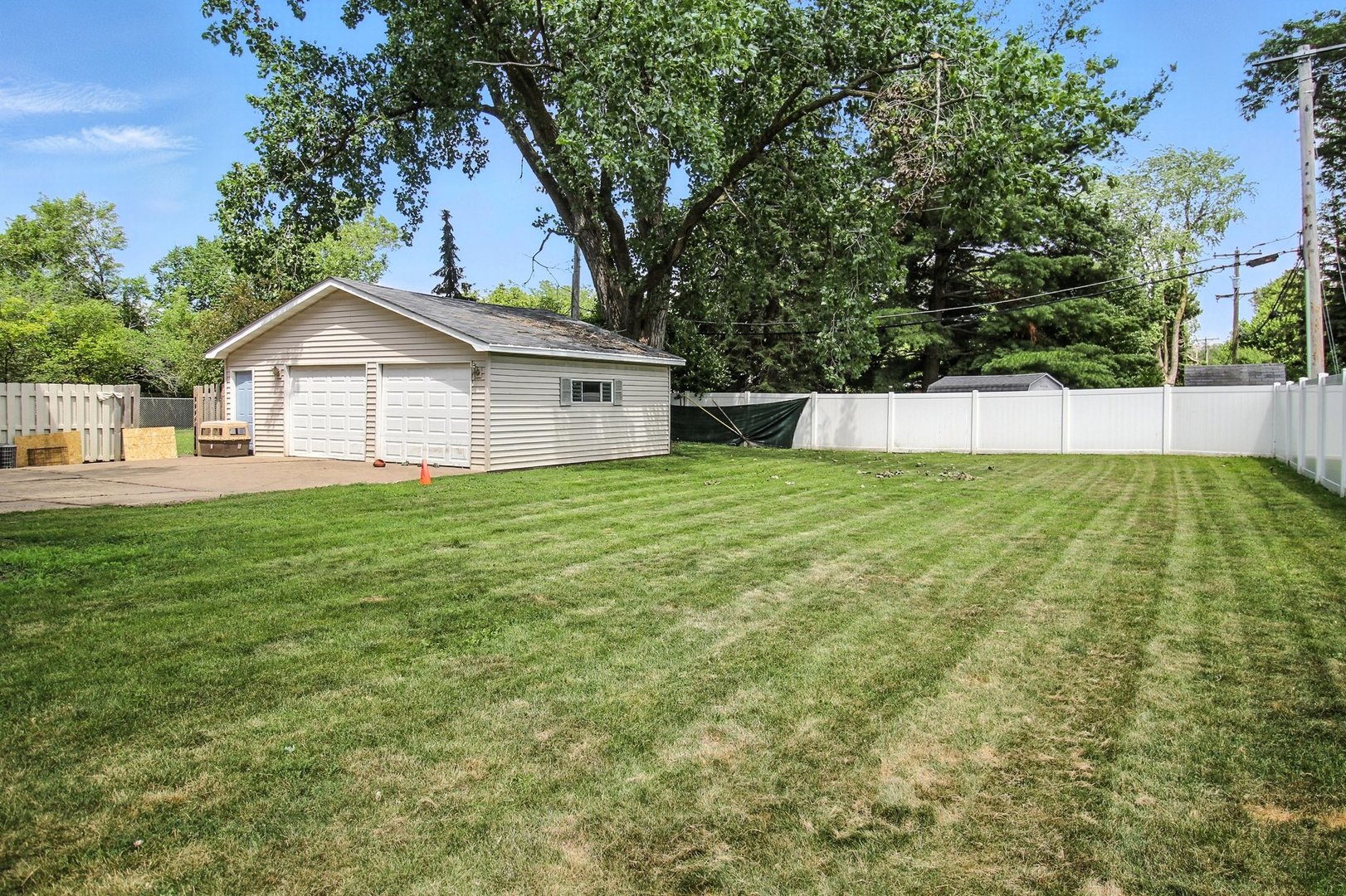 406 Madison Street Joliet, IL 60435 - Photo 7 of 40 a view of a house with a yard