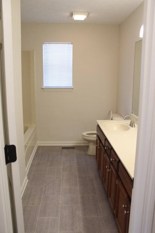 803 Red Hollow Drive Springfield, TN 37172 - Photo 9 of 9 a bathroom with a sink a toilet and shower
