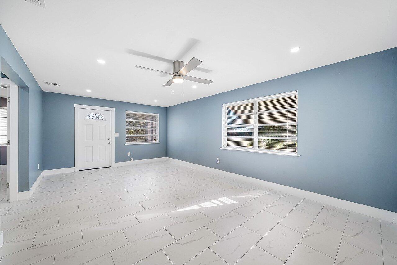 3527 Kirk Road Lake Worth, FL 33461 - Photo 12 of 25 a view of an empty room with a window