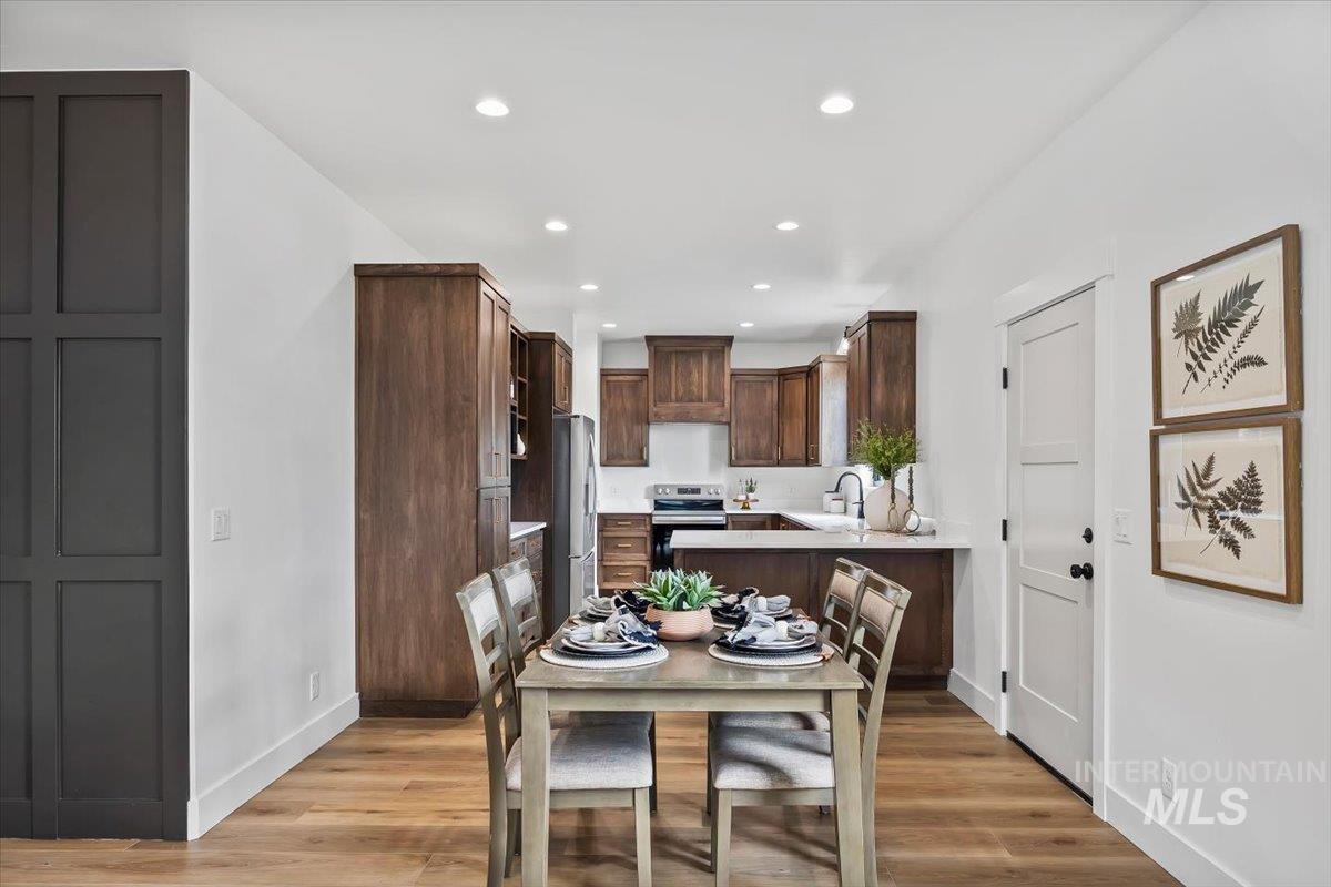107 3rd Street West Declo, ID 83323 - Photo 8 of 25 Dining area with wood-finish flooring