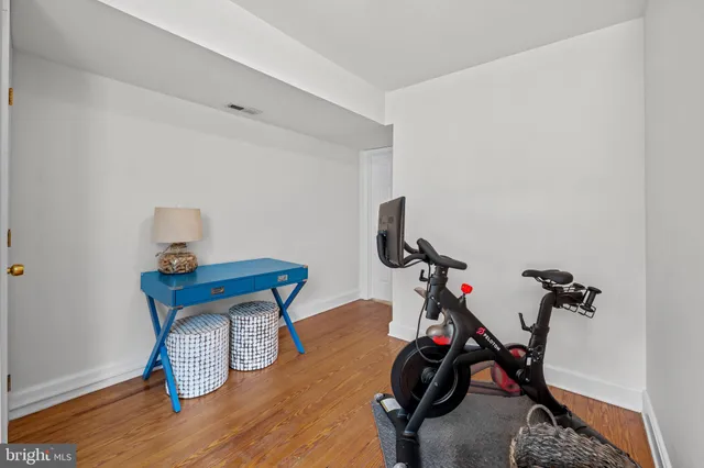 a bathroom with a bathtub and a toilet