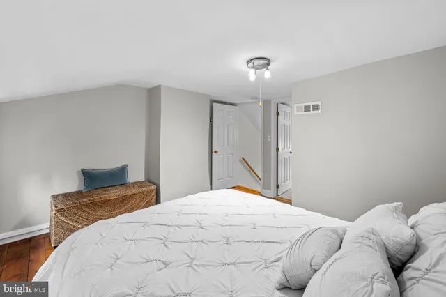 a bathroom with a sink a shower and a mirror