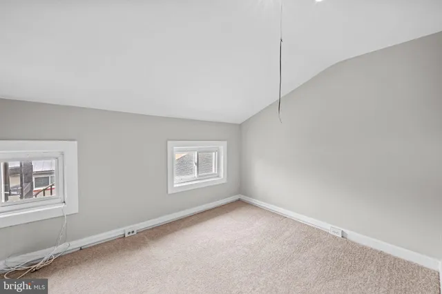 a view of backyard with tv and outdoor space