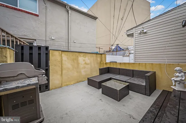 a view of storage and utility room with washer and dryer