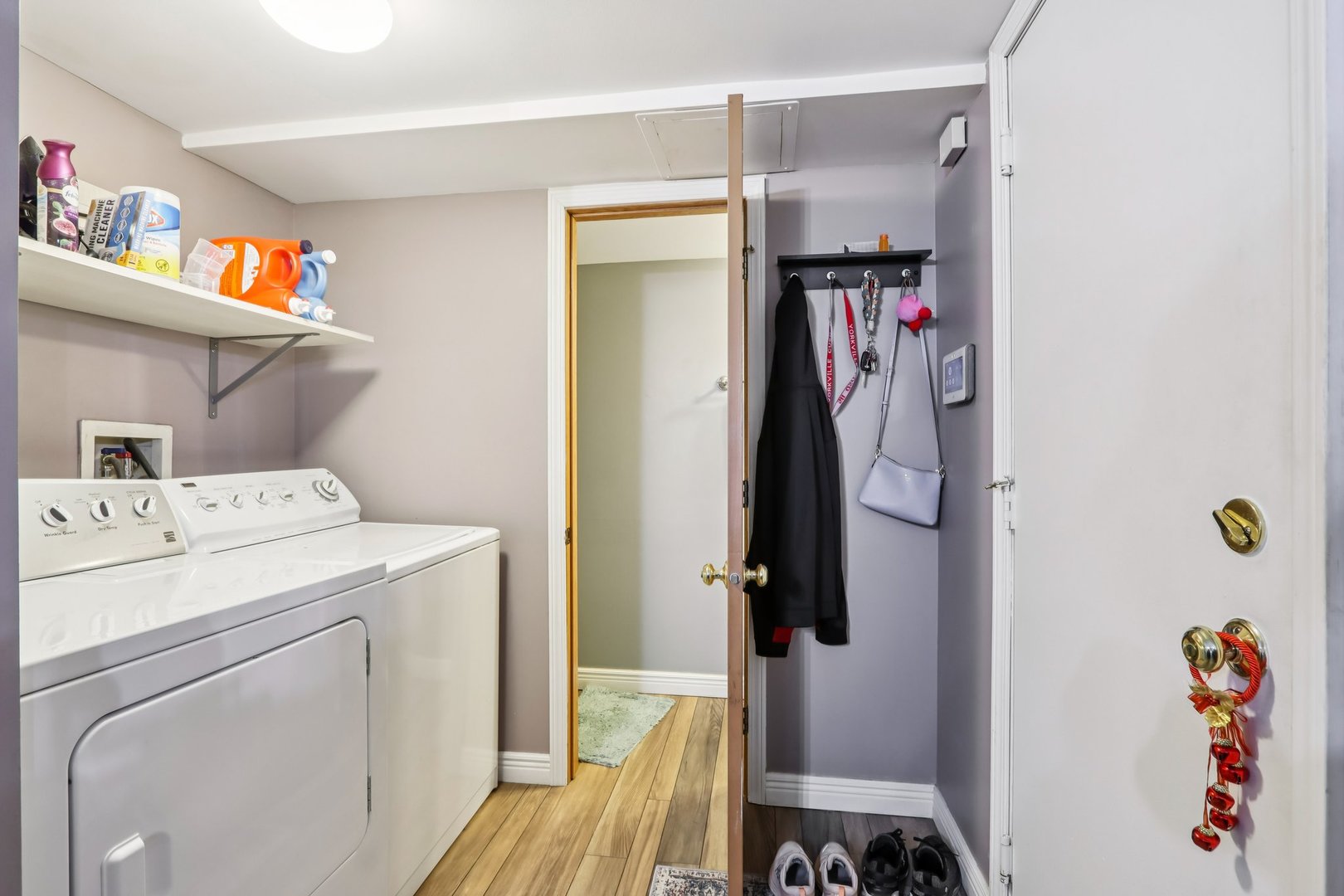 1010 Symphony Drive Aurora, IL 60504 - Photo 22 of 28 a utility room with dryer and washer