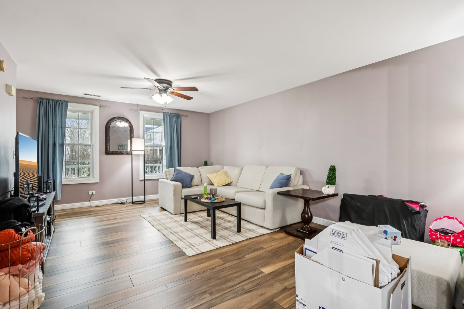 1010 Symphony Drive Aurora, IL 60504 - Photo 5 of 28 a living room with furniture and wooden floor