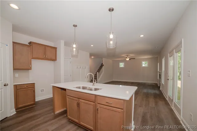 a bathroom with a sink a vanity and a mirror