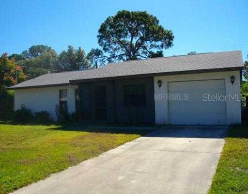 365 Marquette Road Venice, FL 34293 - Photo 1 of 1 a front view of house with yard and trees in the background