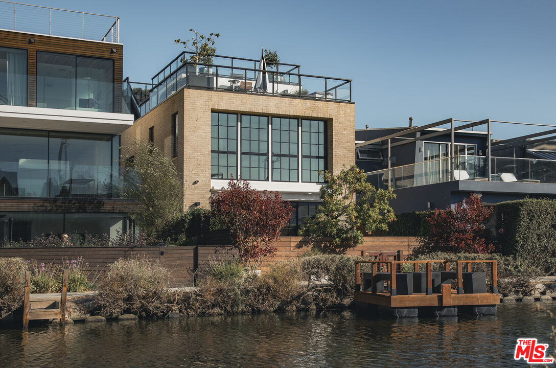 a view of house with swimming pool and outdoor space