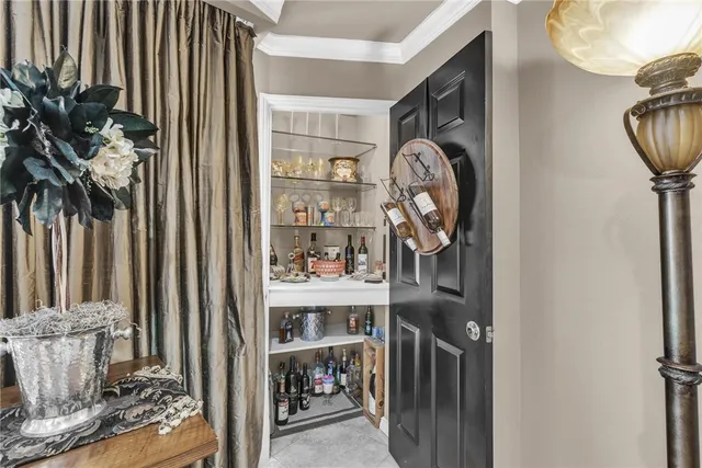 a view of a a dining room with furniture window and wooden floor