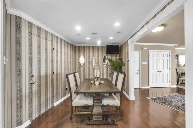 a kitchen with cabinets and stainless steel appliances