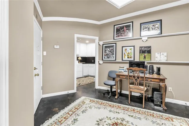 a utility room with cabinets washer and dryer