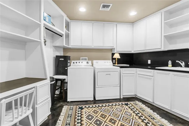 a balcony view with a couch and large windows