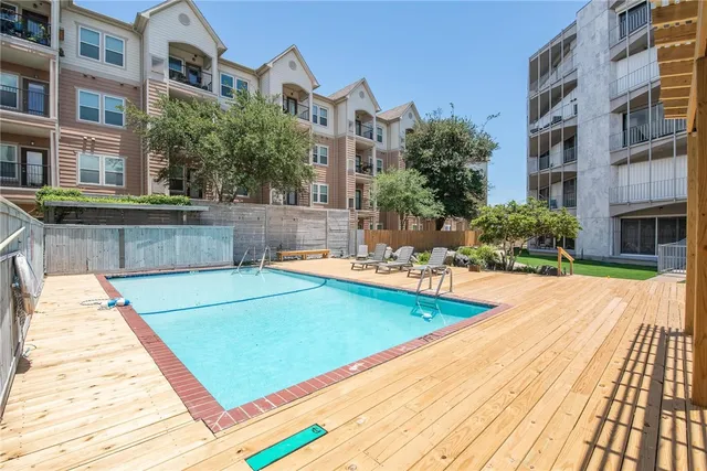 a view of a house with swimming pool