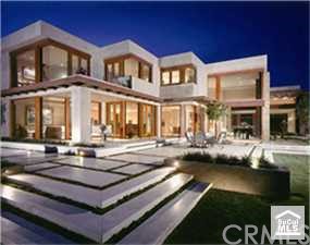 This striking warm contemporary home has views to San Diego and Beyond.  With walls of glass that take advantage of every changing moment of the magnificent coastal panorama.