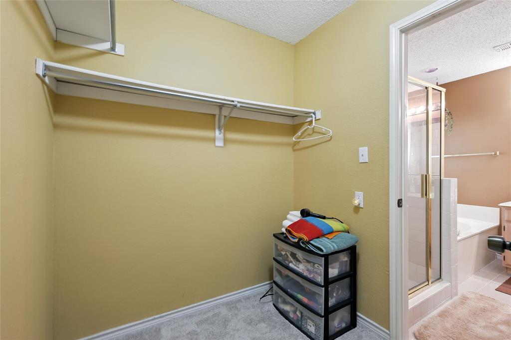 4609 Hunters Ridge Drive Sachse, TX 75048 - Photo 24 of 38 a room with storage and utility