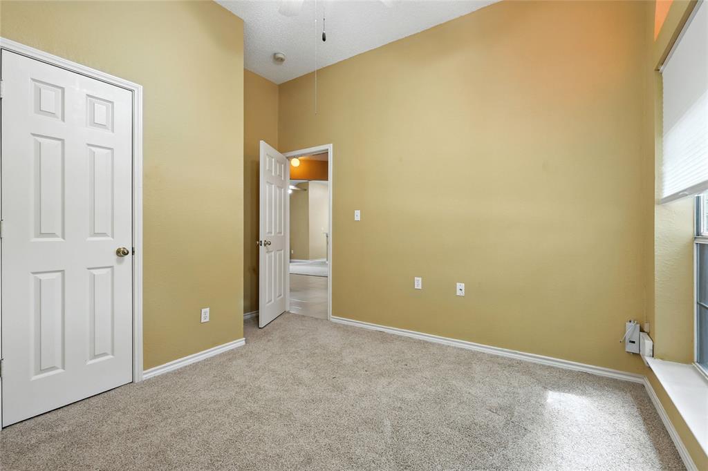 4609 Hunters Ridge Drive Sachse, TX 75048 - Photo 28 of 38 an empty room with windows