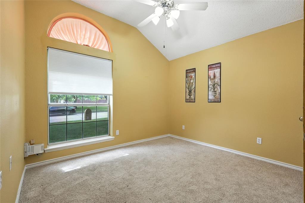 4609 Hunters Ridge Drive Sachse, TX 75048 - Photo 29 of 38 an empty room with a window