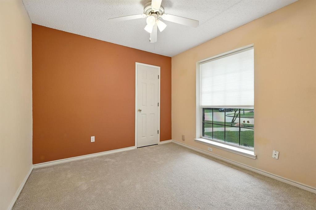 4609 Hunters Ridge Drive Sachse, TX 75048 - Photo 30 of 38 an empty room with a window